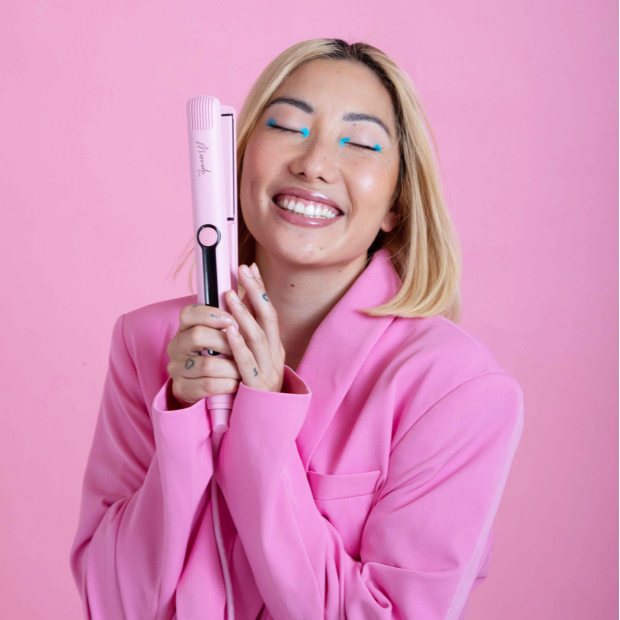 Model using the Mermade Hair Straightener - 1.1 Inch