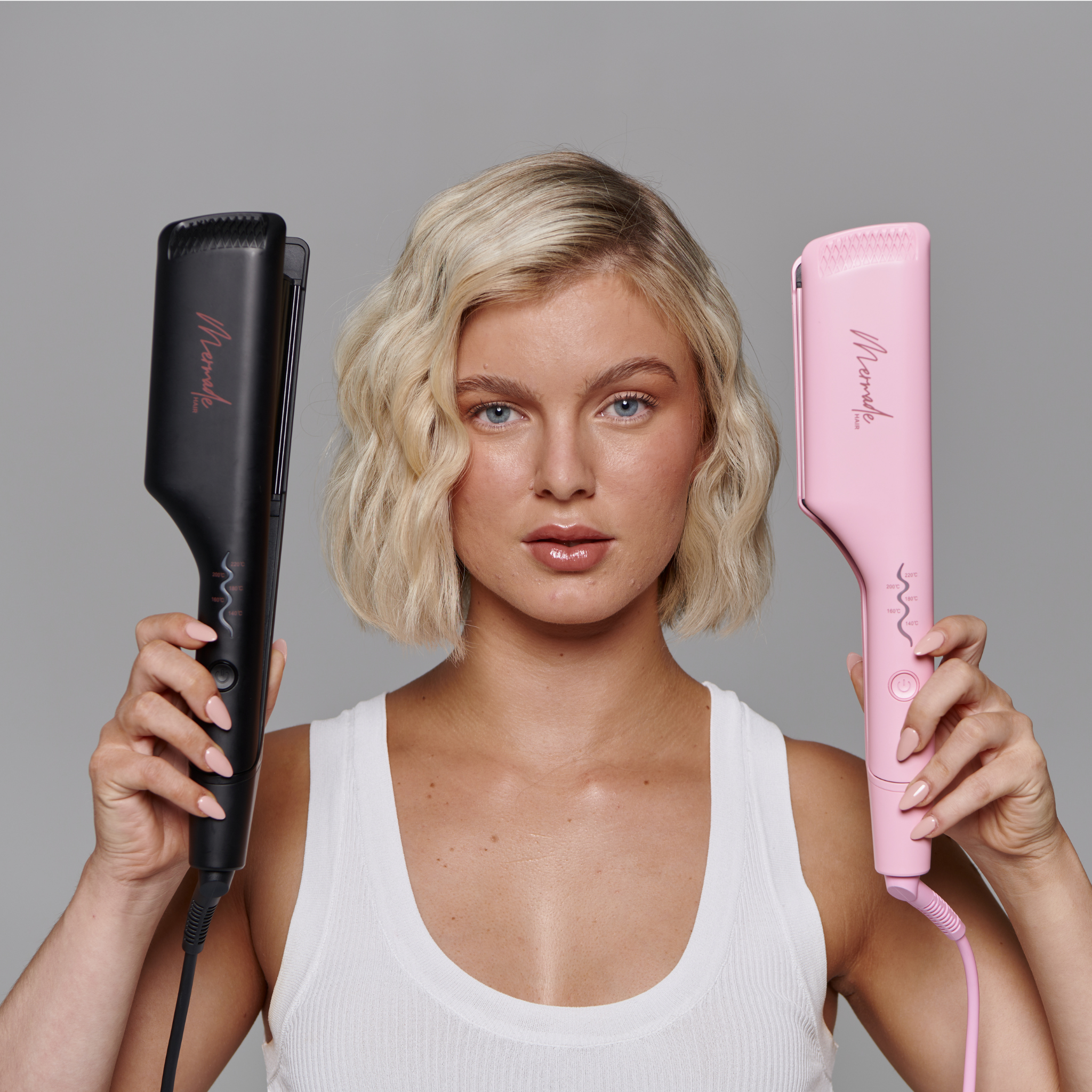 Model using Mermade Hair Double Waver Pink