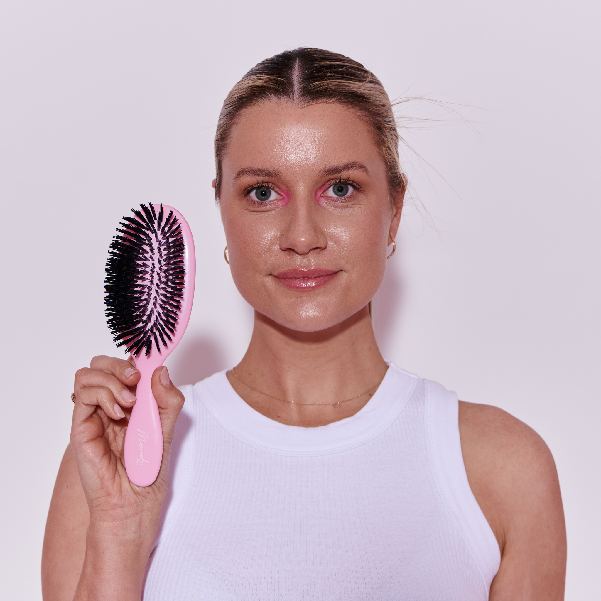 Model using the Mermade Hair Styling Brush