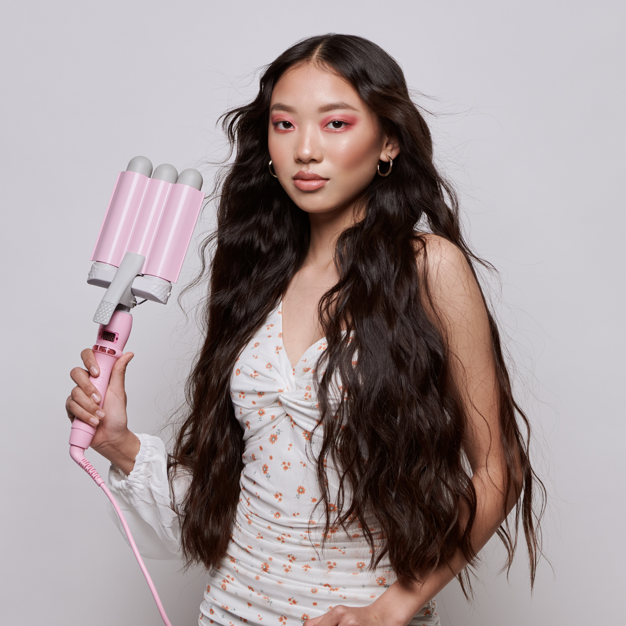 Model using Mermade PRO Hair Waver - 1.25" Pink