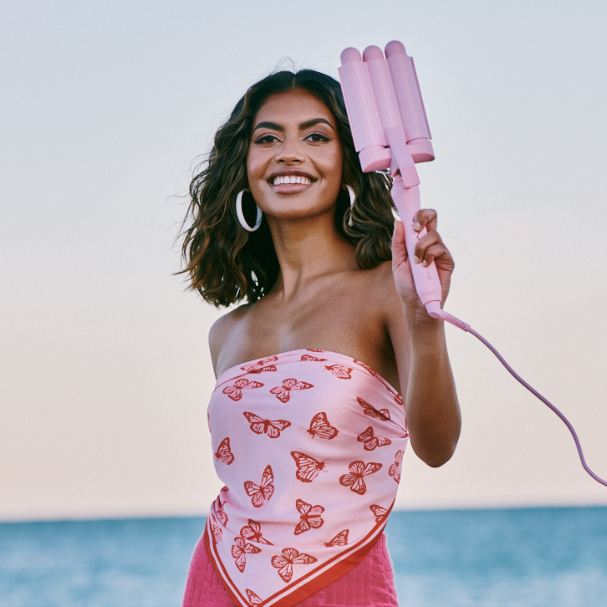 Model using the Mermade Hair Style Wand