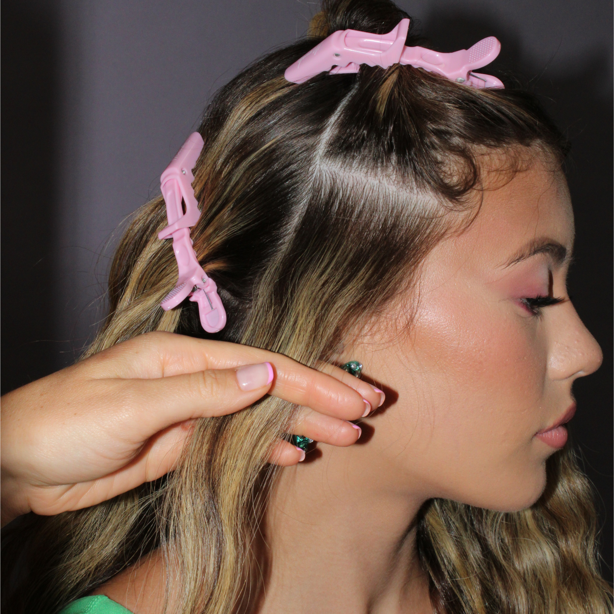 Model using the Mermade Hair Pink Grip Clips