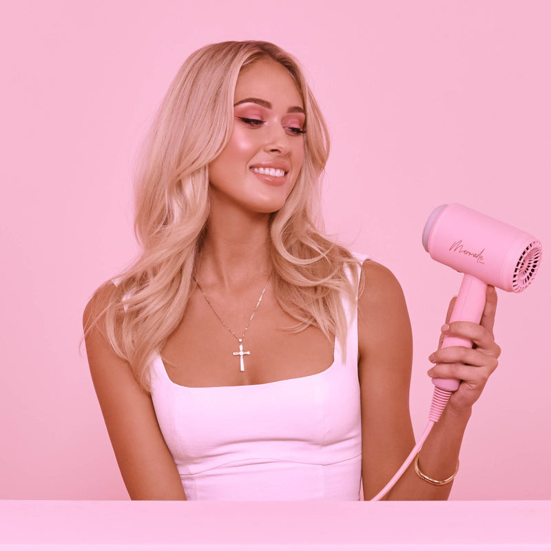 Happy Model with Mermade Hair Dryer close up